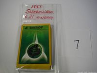 31 Energy cards in sealed plastic bag with hand-written label '1999 Shadowless x31 Energy'. Card faces not fully visible but backs show.