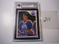 Front view of the 1985-86 O-Pee-Chee #155 Jari Kurri hockey card in KSA graded case with 8.5 Near Mint-Mint Plus grade label, showing player portrait in Edmonton Oilers uniform.