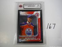 Front image of 2015-16 Connor McDavid hockey card graded GEM MINT 10 by KSA showing player in Edmonton Oilers jersey.