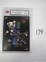 Frontal view of the card in protective sleeve showing grading label and Wayne Gretzky image.