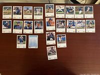 Top view of 23 Toronto Blue Jays baseball cards from the 1993 Upper Deck series laid out in rows showing fronts with player images and team logos.