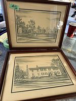 Both framed prints together showing Dundurn Castle and Battlefield House, with visible frames and cream mats.