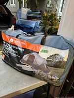 Packing bag for Ozark Trail 5 piece premium combo tent set showing brand and image of tent.