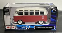 Front view of the Maisto Volkswagen Van Samba diecast model in box, showing the red and white color and model details.