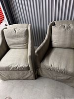 Two chairs side by side showing front profiles