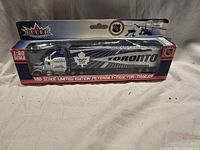 Front view of boxed Fleer 1:80 scale Toronto Maple Leafs tractor trailer model