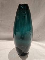 Front view of teal Holmegaard Greenland vase
