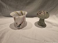 Overall view of vase and mushroom glass pieces