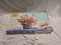 Box top view showing artwork and title