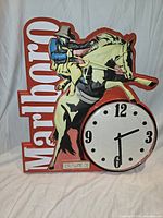 Full view of Marlboro plastic wall clock showing design and size