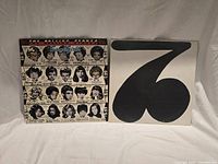 Front covers of both Rolling Stones albums