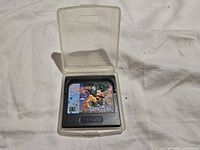 Cartridge inside open clear case showing label