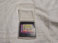 Cartridge in open clear case, full view