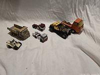 Group shot of all six vehicles on white background