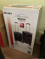 Box front view showing both suitcases and model graphics
