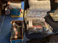 Overall view of multiple packages of white and black yarn skeins stacked on a chair