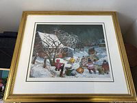 Front view of framed art print with children in a snowy landscape by Pauline Paquin.