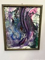 Full front view of the framed abstract oil painting showing the colorful composition.