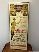 Full frontal view of the framed Mister Roberts movie poster showing the title, main character in uniform, actor names, and vintage style.