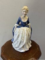 Front view of the Royal Doulton Alison lady figurine showing the detailed hand-painted dress and face.