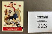 Front view of the Jean Beliveau autographed 1994-95 Parkhurst hockey card showing the player image, autograph in black Sharpie and card design.