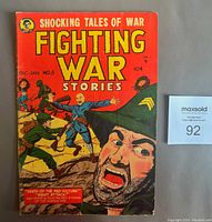 Front cover of the comic book showing title and artwork depicting soldiers in battle with a red background.