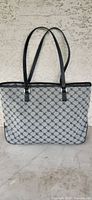 Front view of gray tote handbag with repeating RL monogram pattern and black leather straps