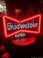 sign illuminated in dark environment