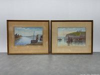 Both vintage framed paintings together, showing size and condition.