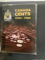 Front cover of the Canada Cents 1920-1982 coin book with a visible Canadian crest and gold lettering.