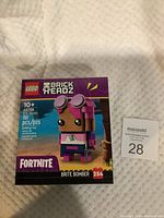 Photo of Lego BrickHeadz Fortnite Brite Bomber set 40728 in unopened retail box showing front packaging with piece count and branding.