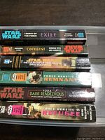 Spine view of six Star Wars novels showing titles and condition.