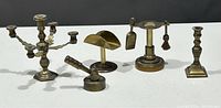 Overview of all 5 brass miniatures including the candelabra, candlestick, judge's gavel, and fireplace accessories (shovel and brush).