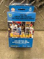 Blue sealed pack of Topps 2022 MLB baseball trading cards featuring 35 cards and promotional images of MLB players on front.