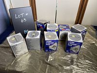 Eight boxed spotlights arranged in two rows showing brand names and packaging details.