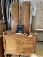 Photos of vintage wooden bed frame components including headboard, footboard, and rails, showing natural wood grain and construction details.