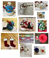 Overall view of lot contents showing snowman cookie jar, glassware, mugs, plush toys, stockings, gift wrap, ornaments, and Christmas décor items