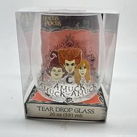 Front view of the clear glass with printed Hocus Pocus characters and phrase 'AMUCK AMUCK AMUCK.' The glass is inside clear packaging.