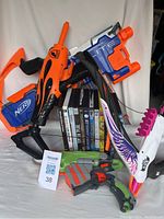 Group photo showing 4 Nerf toys and 12 DVDs in a standing arrangement for clear visibility.