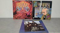 Front cover of all three vinyl albums in the lot, two Climax Blues Band albums and one The Blues Brothers album.