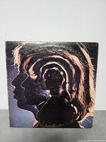 Front cover of The Rolling Stones double LP album showing layered silhouette artwork of band members