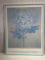 Full view of framed museum print titled 'Blue Chrysanthemum' by Piet Mondrian with visible text 'Solomon R. Guggenheim Museum New York'.