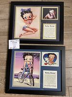 Two framed Betty Boop collages, each 16"x13" with minor scratches on frames.
