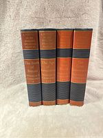 Four vintage hardcover books by Winston Churchill including The Birth of Britain, The Age of Revolution, The New World, and The Great Democracies, spines shown upright.