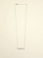 Full view of the silver chain necklace with bar pendant containing five clear cubic zirconia stones arranged in a wavy pattern.