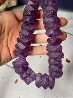 Detail of purple amethyst beads close-up