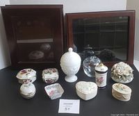 All items displayed together including trinket boxes, decorative jars, and wooden boxes