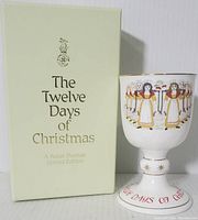 Goblet displayed outside the box showing box design and goblet details.