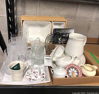 Photo showing white ceramic salad set in wooden case, Belleek mug, floral dish, various glassware and white ceramic pitchers and sauce boats