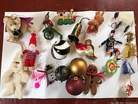 Close up of assorted Christmas ornaments in various shapes and designs